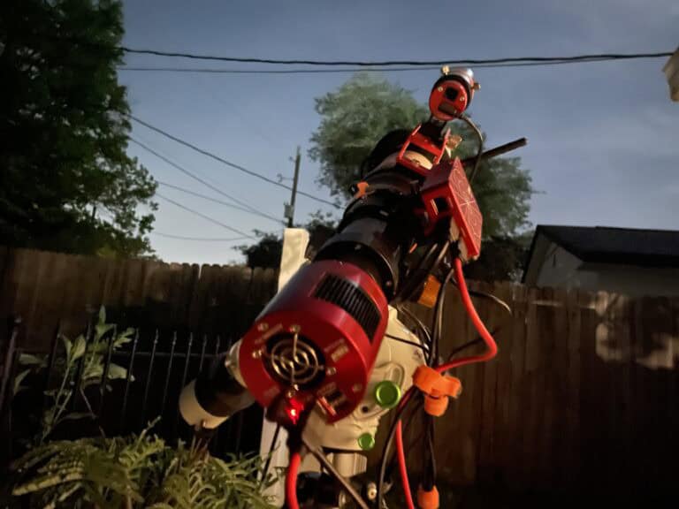 Star Adventurer GTi mount and SV503 refractor set up in a Bortle 9 backyard for an overnight astrophotography session