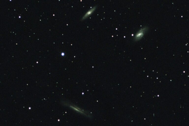 The Leo Triplet galaxies — M65, M66, and NGC 3628 — imaged from a Bortle 9 backyard in Florida using an Optolong L-Pro filter