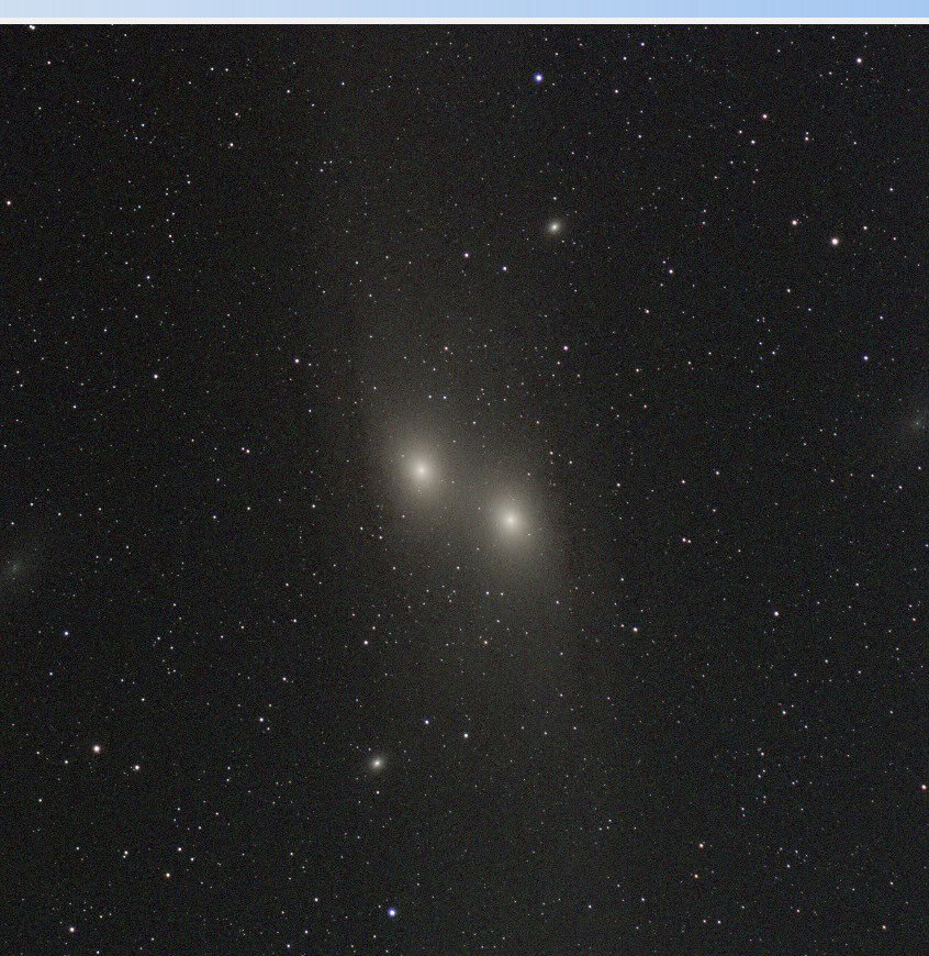 DeepSkyStacker two-frame stack of Andromeda showing two galaxy cores and doubled stars from a registration error